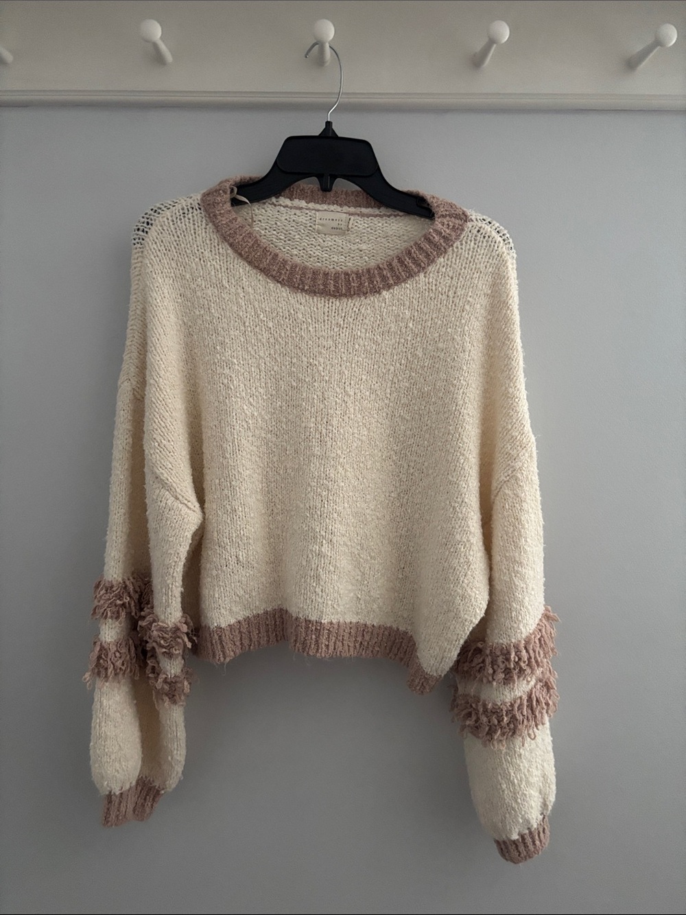 Cream Crewneck Sweater with Dusty Pink Trim and Fringe